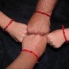 Купить заговоренную красную нить.